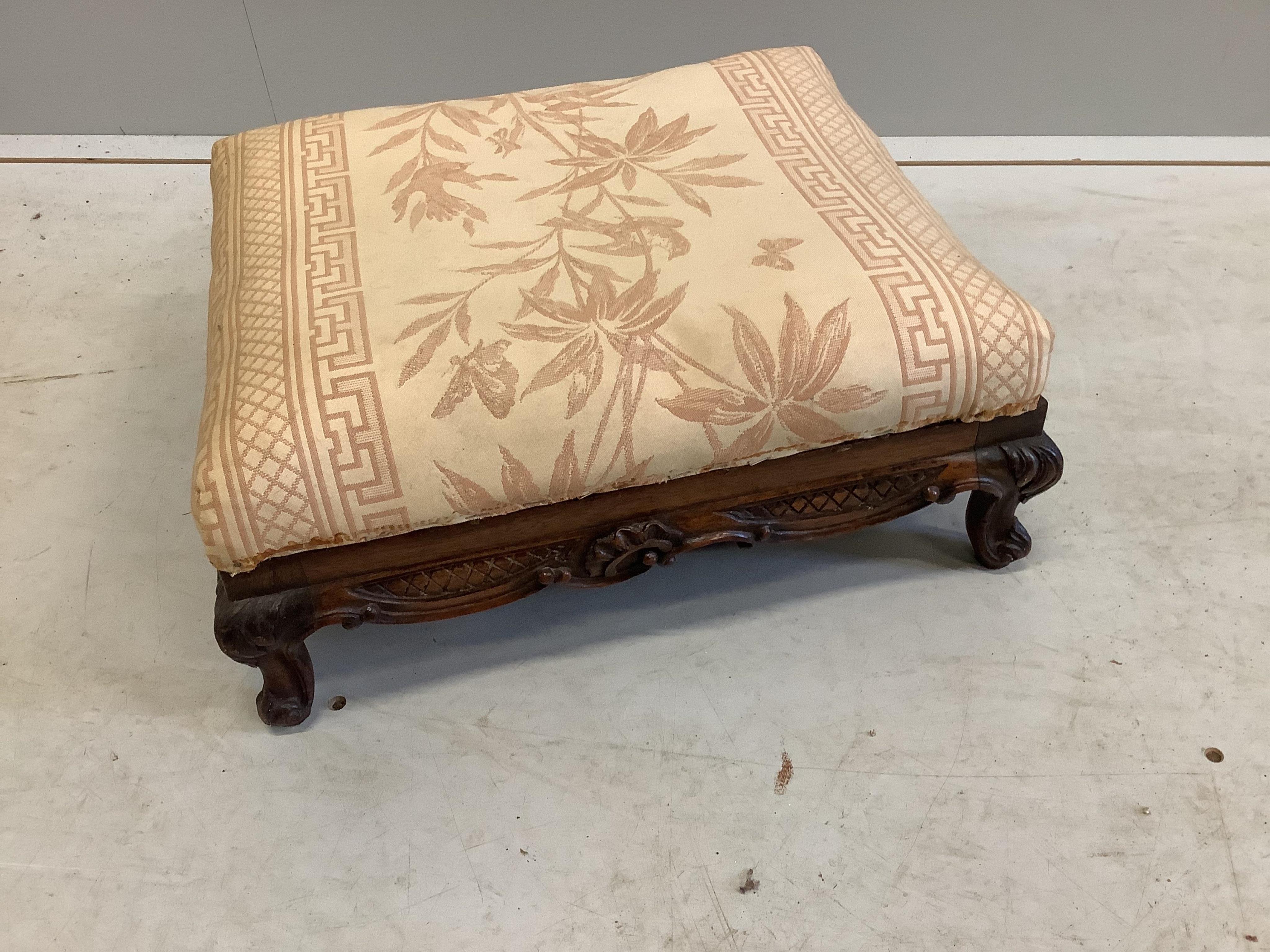 A Victorian carved mahogany square topped footstool, width 42cm, depth 37cm, height 18cm. Condition - fair